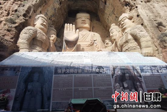 時(shí)下，中國(guó)“石窟鼻祖”天梯山石窟第13窟大佛足部與局部危巖體搶救性保護(hù)項(xiàng)目正在施工。圖為施工現(xiàn)場(chǎng)。陳曉斌 攝